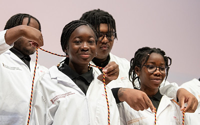 UMB CURE Scholars Program Celebrates Future STEM Leaders at White Coat Ceremony 