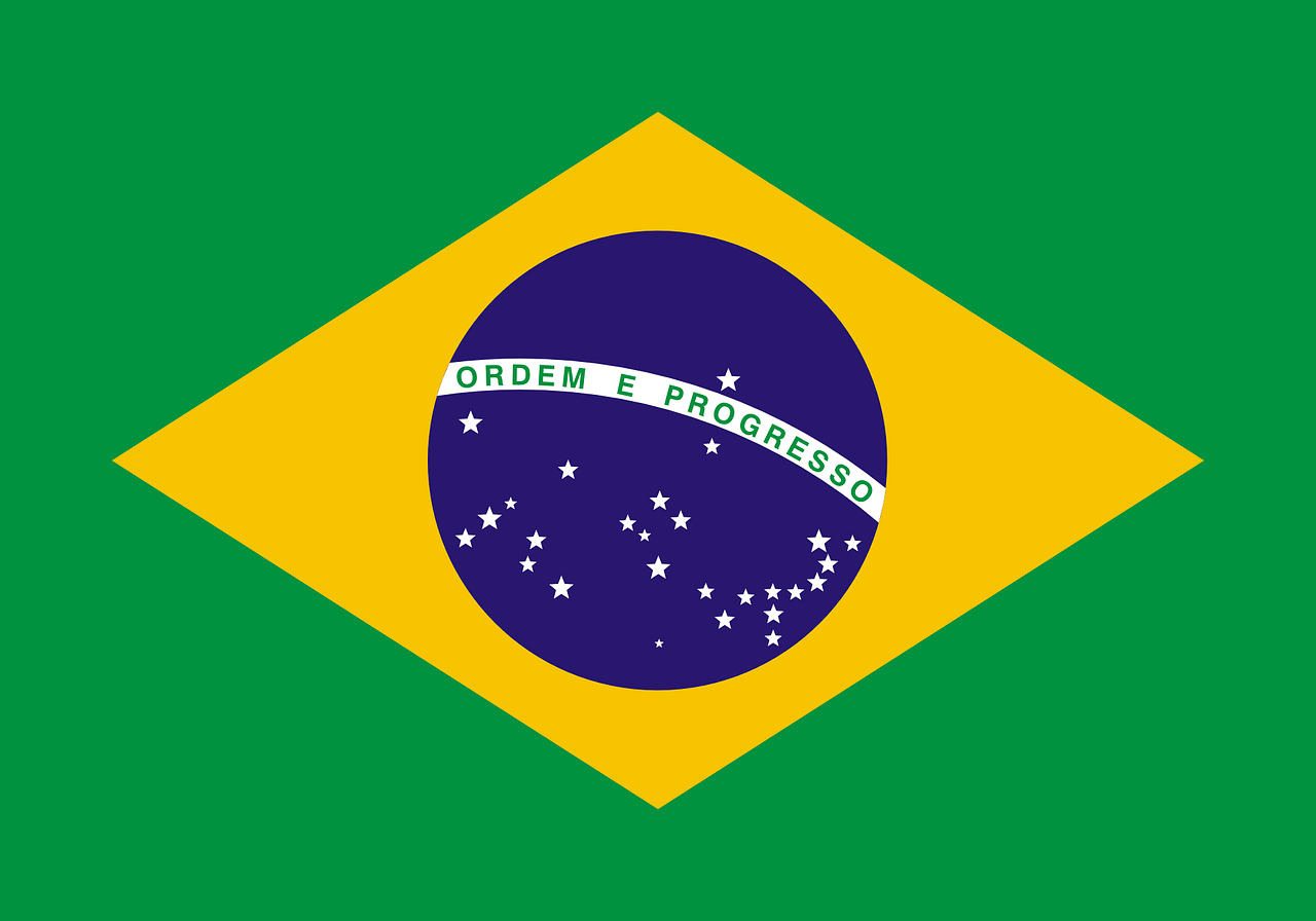 Flag of Brazil with a blue planet on a yellow diamond with a green background