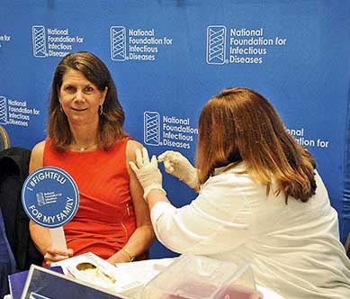 Kathleen Neuzil,Director of the Center for Vaccine Development (CVD) at the University of Maryland School of Medicine (UM SOM), gets her flu vaccine. 