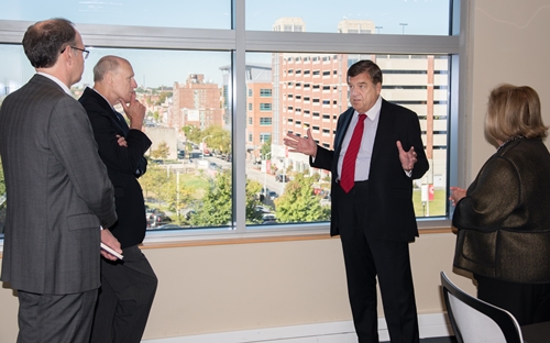 (l-r) BioPark President Jim Hughes, UMB Chief Academic and Research Officer Bruce Jarrell, Rep. Ruppersberger, and BioPark Senior Vice President Jane Shaab look out on the University of Maryland BioPark.