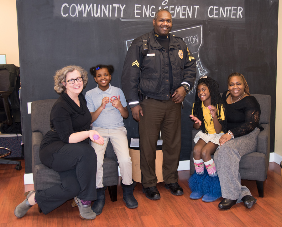Students from James McHenry Elementary/Middle School take part in the PAL program under the leadership of (L to R) CEC Coordinator Kelly Quinn, Cpl. Eugene Douglass, and Cpl. Hazel Lewis. 