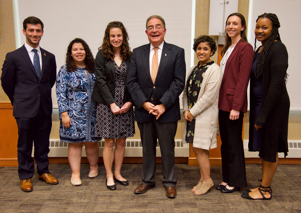 Left to right, President’s Fellows Zachary Lee; Jenny Afkinich, MSW; and Jessica Egan; President Jay A. Perman, MD; and fellows Vibha Rao, MD ’18, Nicole Campion Dialo, and Lauren Highsmith, MSW ’19.