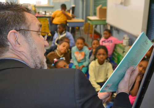 Richard P. Barth, PhD, MSW reads to students of Promise Heights partner Historic Samuel P. Coleridge-Taylor Elementary School