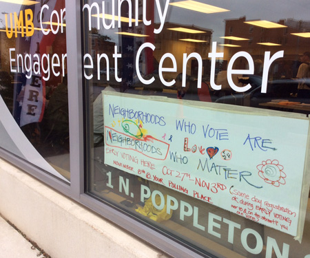 A poster made by University of Maryland, Baltimore neighbors who participate in programs at the Community Engagement Center is on view at the early voting site for Baltimore residents. 