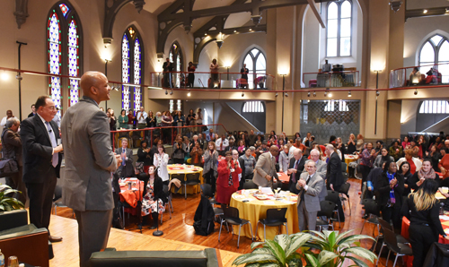 Wes Moore receives a standing ovation from the audience at Westminster Hall.