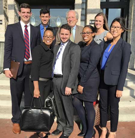Maryland Carey Law Professor Doug Colbert and Fall 2016 students of the Access to Justice Clinic pose at the District Court of Maryland.