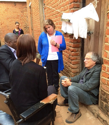Maryland Carey Law professor Douglas Colbert, JD, right, and professor Rebecca Bowman-Rivas, MSW '99, LCSW, manager of the school's Law & Social Work Services Program, center, collaborate with students from UMB and from Chancellor College of Law during a visit to bail clients in Malawi's Zomba Central Prison. 