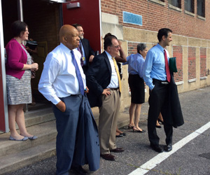 UMB President Jay A. Perman, MD, joins Promise Heights leaders and Congressmen Elijah Cummings and John Sarbanes on a tour of The Historic Samuel Coleridge-Taylor Elementary School.
