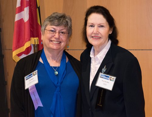 Judy Ozbolt (left), honored for her 46-year career in nursing informatics, appears with SINI conference co-chair Mary Etta Mills.