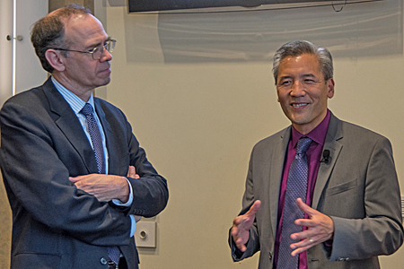 James L. Hughes, MBA, chief enterprise and economic development officer and vice president at UMB, left, speaks with Dean Chang, PhD, associate vice president for innovation & entrepreneurship at UMCP. 