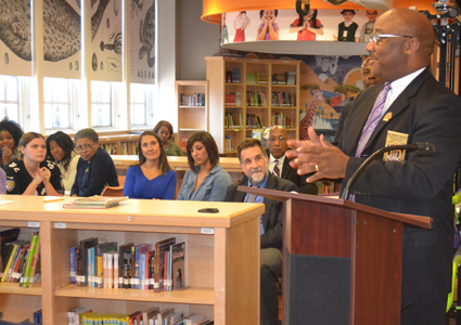 Milton D. Harrison of the Omega Psi Phi Fraternity speaks at an event launching the workforce program for families of students at The Historic Samuel Coleridge-Taylor Elementary School.