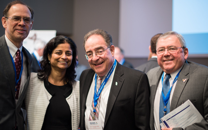 UM Ventures Director James Hughes, MBA, president of the UM BioPark, left; Gayatri Varma, PhD, of MedImmune; UMB President Jay Perman, MD; and BioPark tenant Marco Chacon, founder and chairman, Paragon Bioservices.
