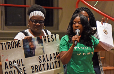 Tawanda Jones (right) tells the story of her brother, Tyrone West, who died in 2013 after being arrested during a traffic stop.
