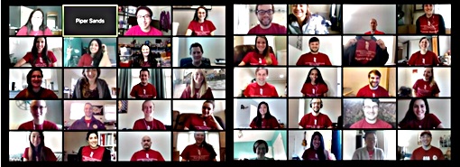 Members of the Physician Assistant Program Class of 2020 discuss their upcoming virtual learning assignments during a Zoom video conference call. Students and faculty were asked to show their school spirit by wearing UMB shirts.