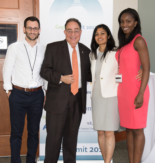 From left, Ben Portney, University of Maryland, Baltimore President Jay A. Perman, MD, Kamalika Saha, PhD'15, and Andong Nkobena, PharmD'16, at GapSummit 2017 at Georgetown University.