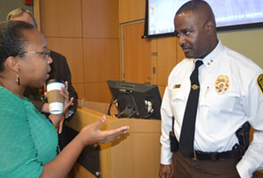 Chief Williams discusses UMB Safety with a Town Hall attendee. I entered this caption in the description field in the media library.