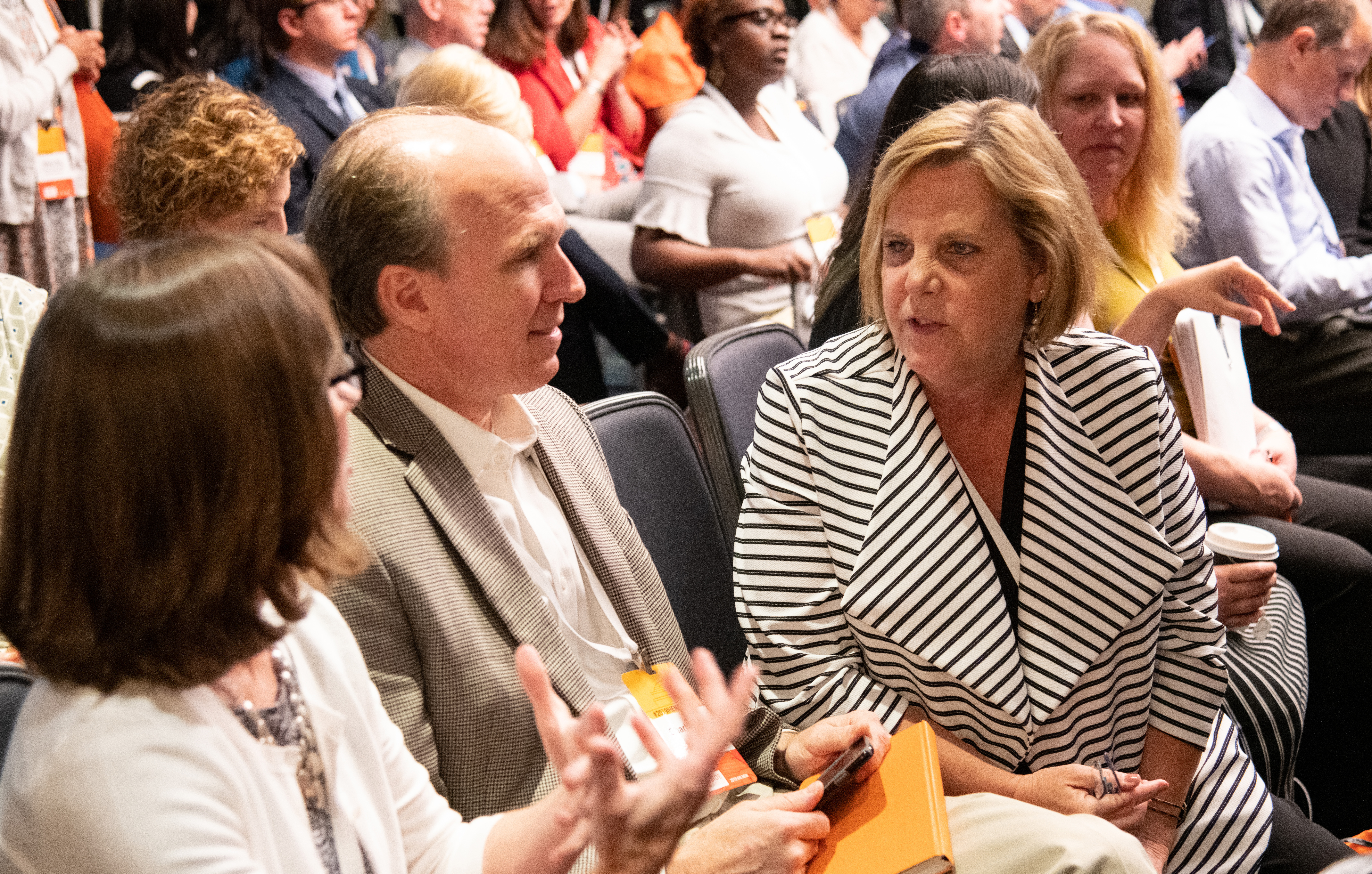 Attendees at the conference held in Baltimore from July 8-10, 2019, discuss the future of public higher education. 