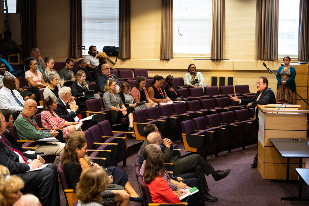 A group of faculty and staff in attendance at President Perman's Q&A on Sept. 17, 2019, listen to his quarterly address.