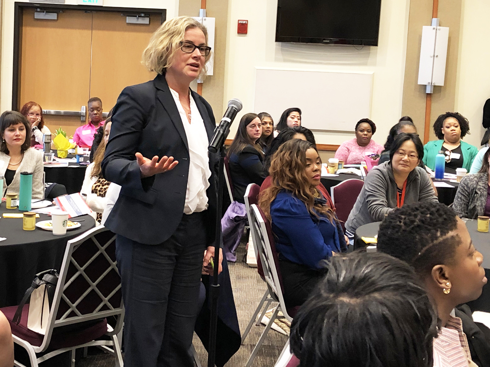 Megan Meyer, PhD, MSW, associate dean for academic affairs at the University of Maryland School of Social Work, asks about risk-taking during the question-and-answer session with entrepreneur Mei Xu, MA.