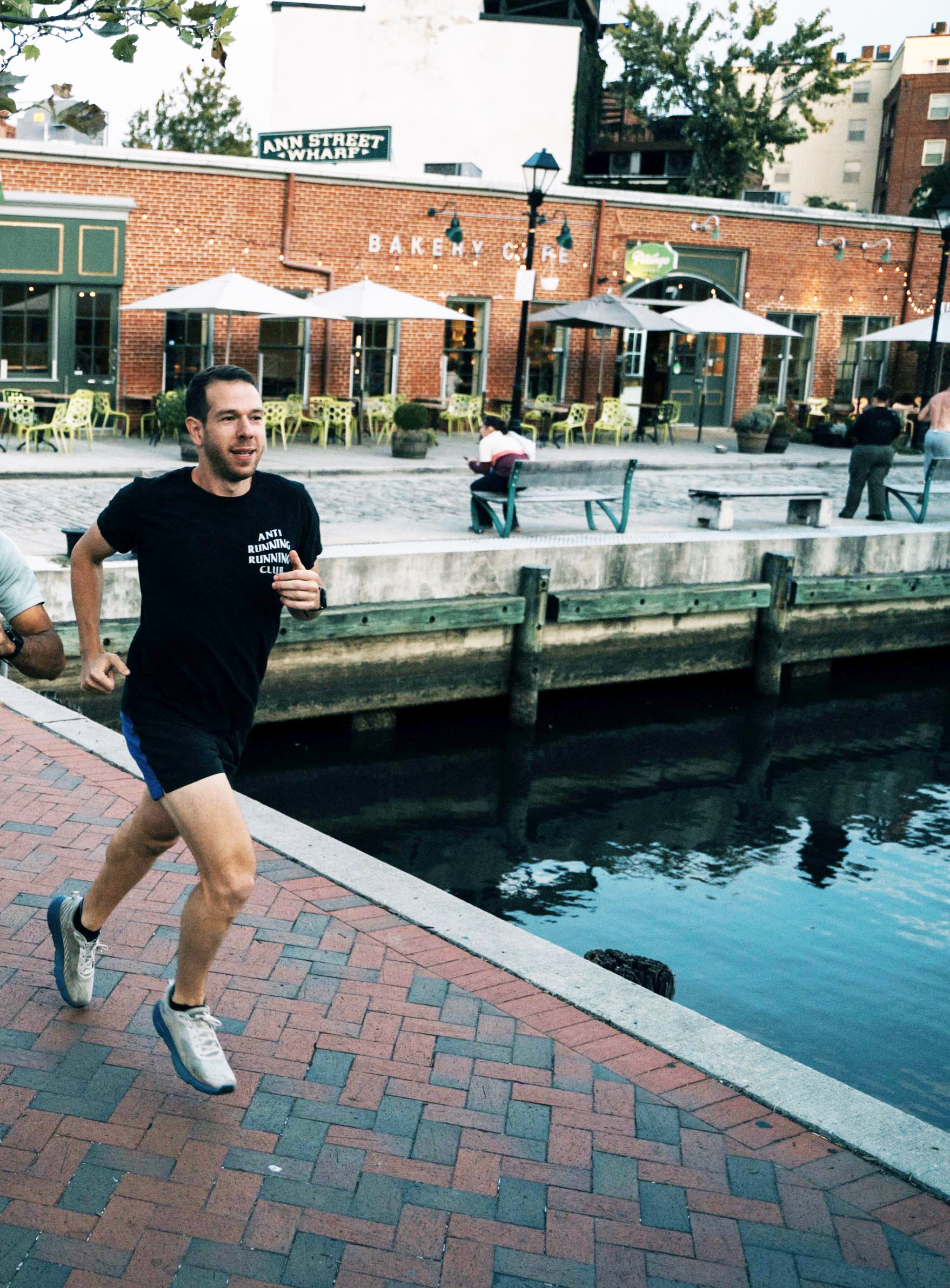 Jeremy Ardanuy running through Baltimore City