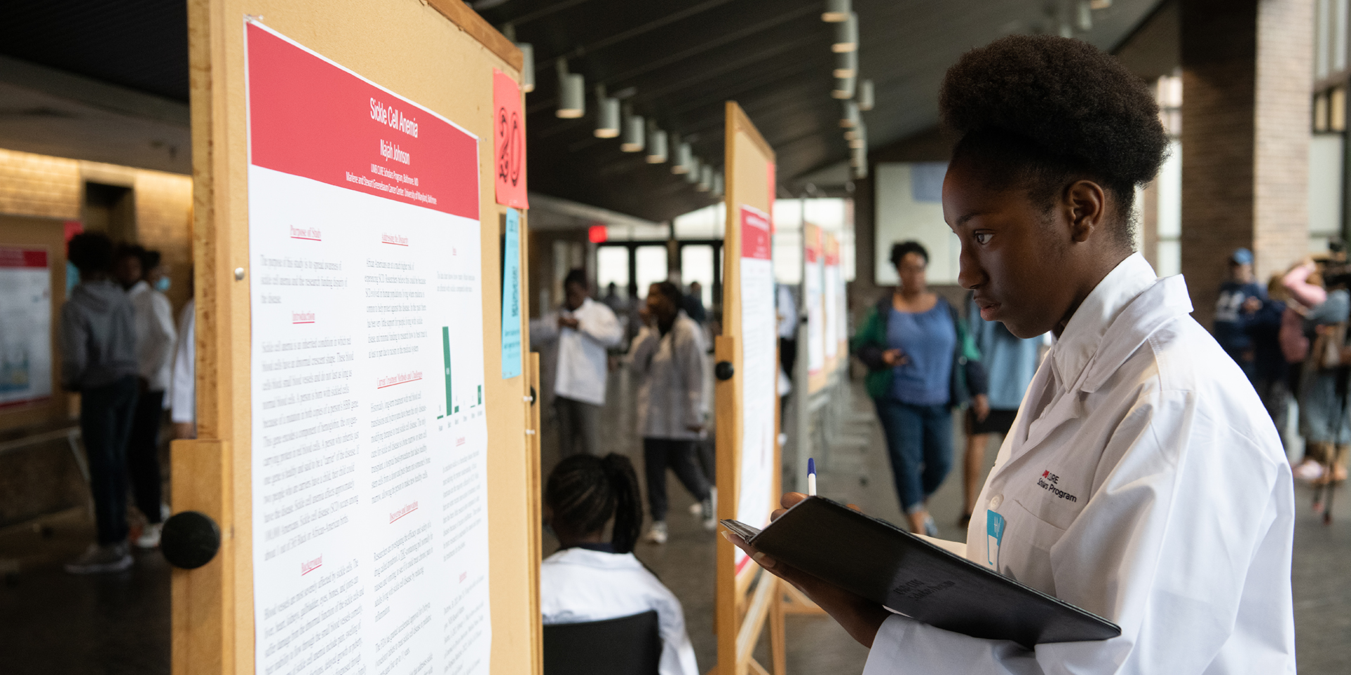 A CURE Scholar reflects on her project poster.