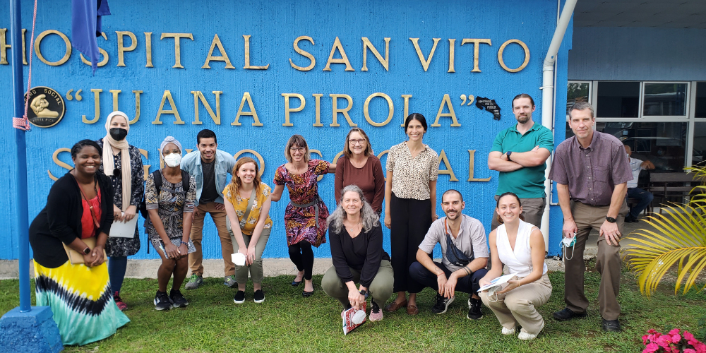 A group of faculty gather outside a hospital in Costa Rica