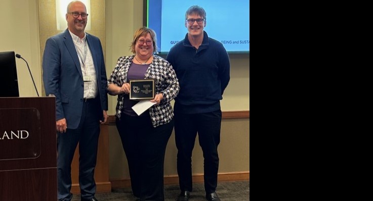 Stacy Marriott accepts her award for Service Excellence