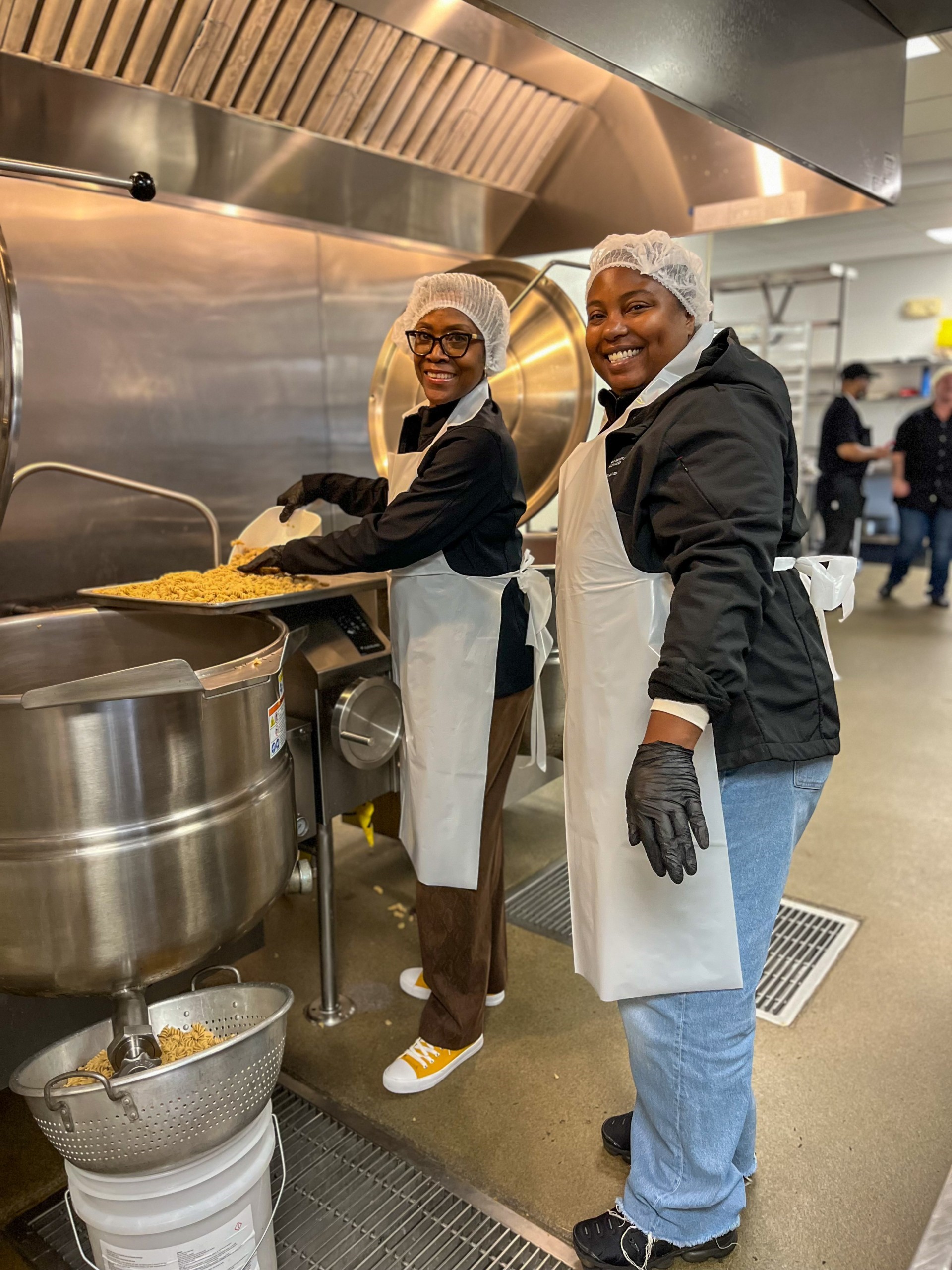 Design and Construction and Procurement staff volunteering in community