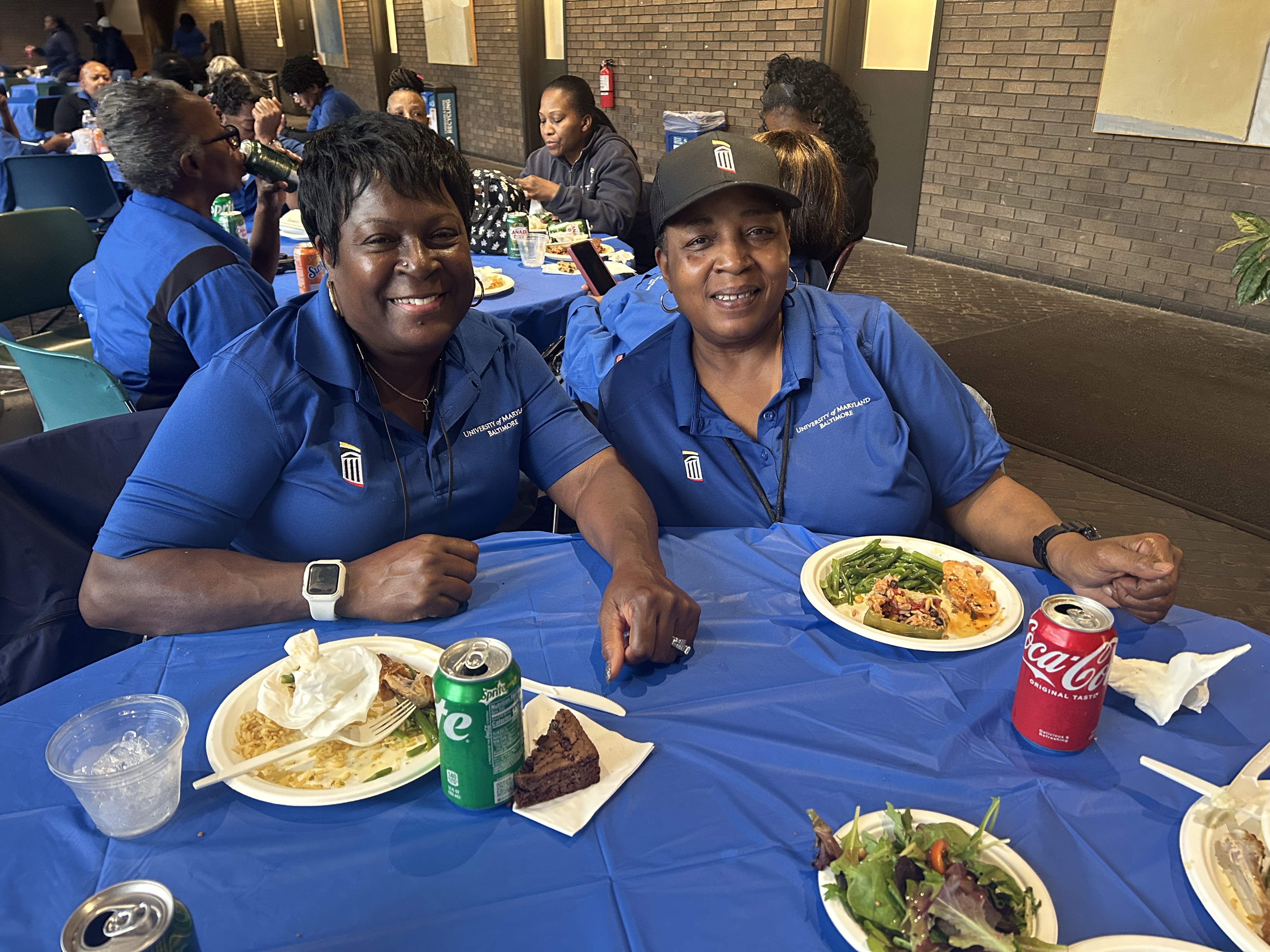 two EVS staff members at lunch