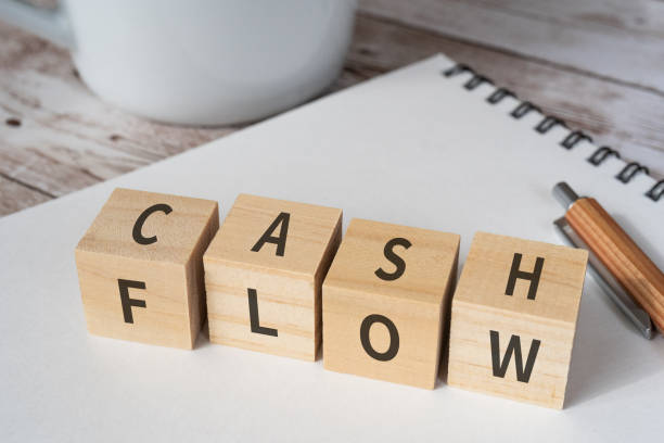 blocks with the words cash flow on it