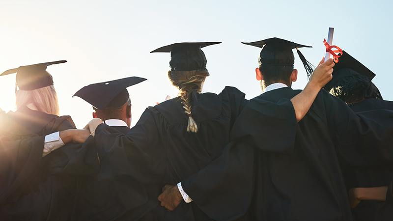 Students in graduation caps and gowns