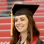 A smiling graduate