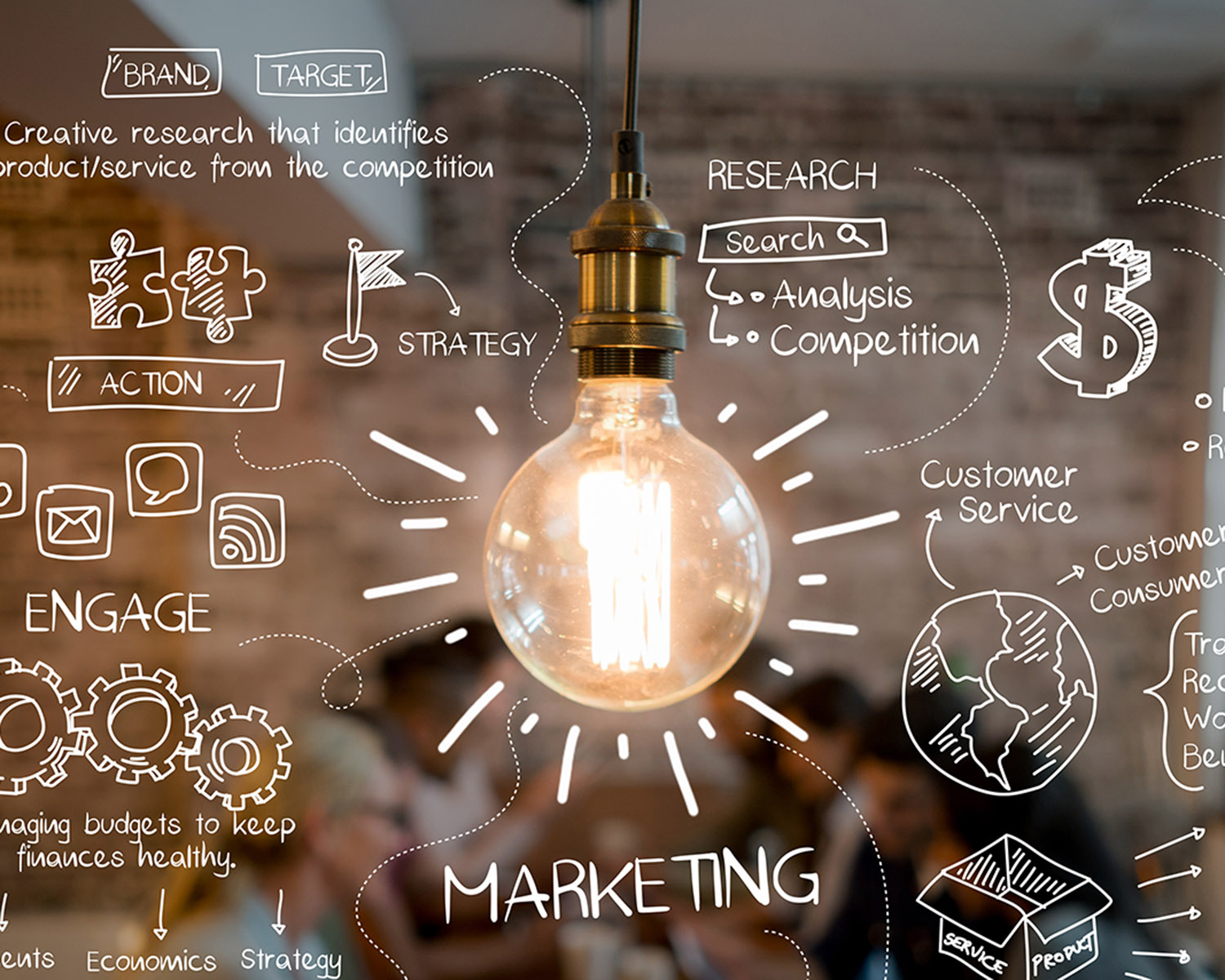image of a lightbulb with marketing ideas and concepts written in white handwriting all around it