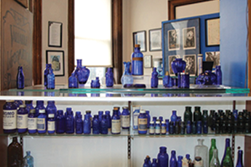 Inside photograph of the Bromo Seltzer Blue Glass Museum in the Bromo Seltzer Arts Tower