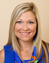 Portrait of Ashley Valis wearing a blue shirt