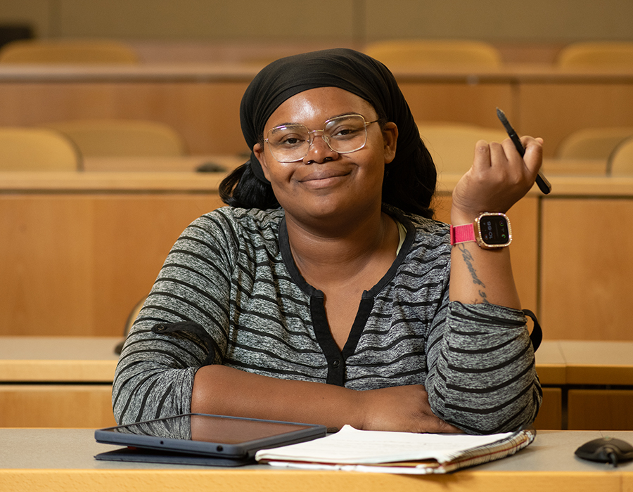 CURE Scholar Princaya Sanders in a lecture hall