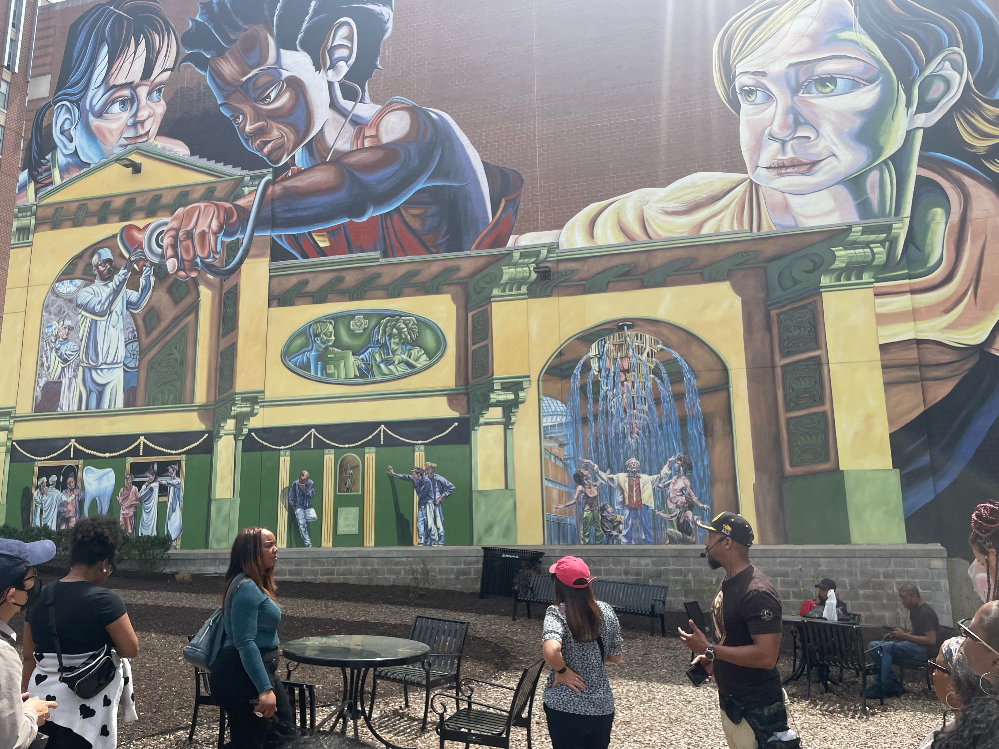 People look at mural