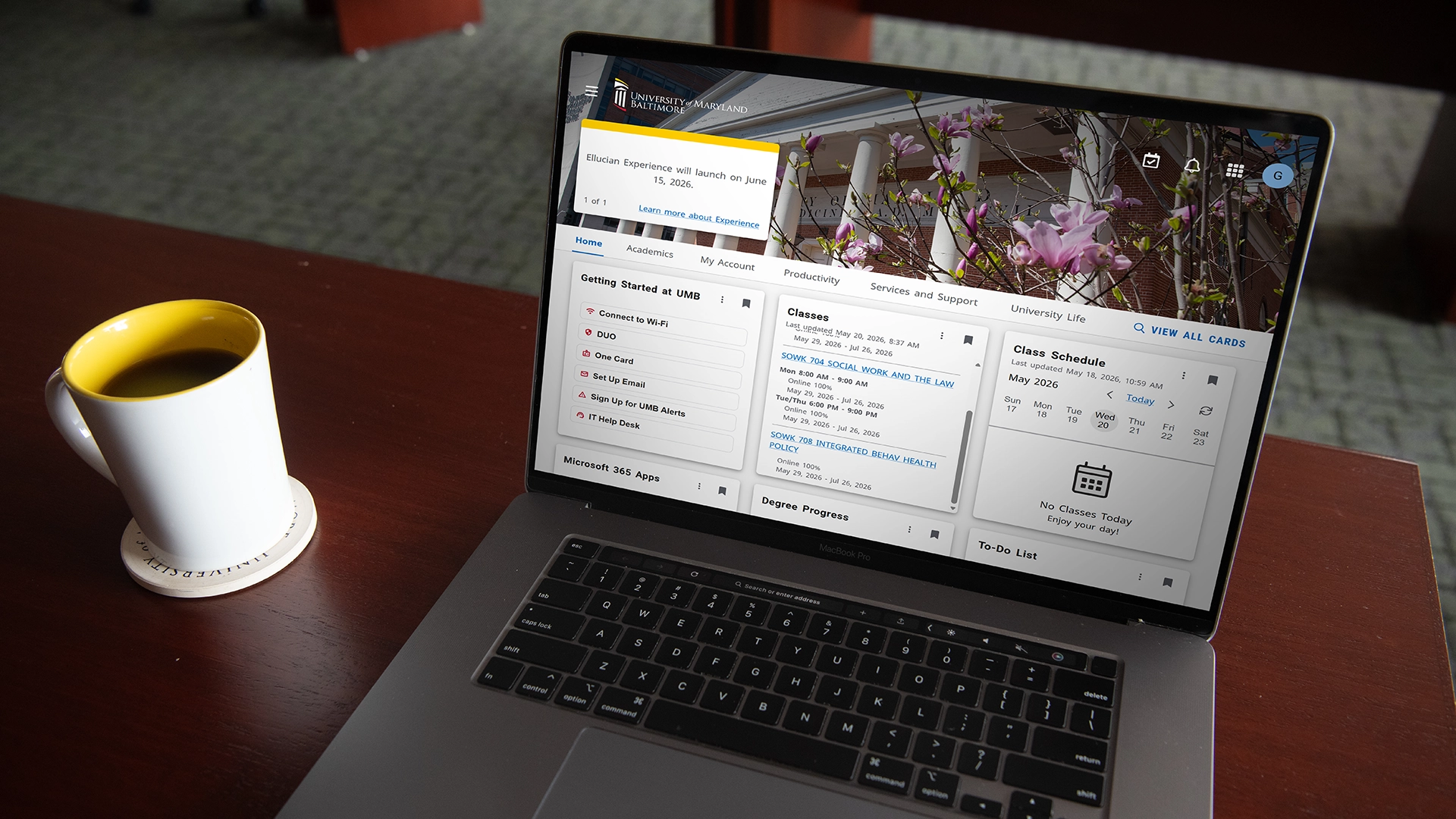 The Experience Student Portal on a laptop screen