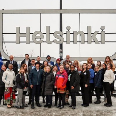 Dr. Nicole Brandt poses with colleagues in Helsinki during her Fulbright experience