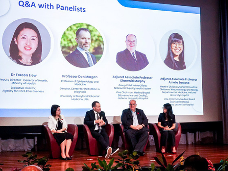 Daniel Morgan and colleagues present at a conference in Singapore