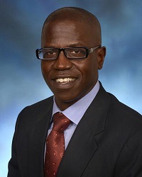 Headshot of man in suit