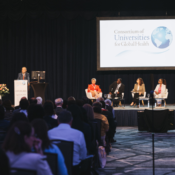 Speakers onstage at CUGH Conference,