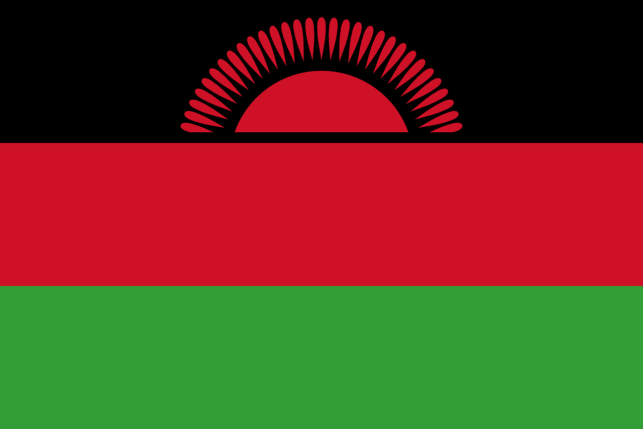 Flag of Malawi with a black stripe at the top with a red rising sun, with a red stripe below it and a green stripe at the bottom