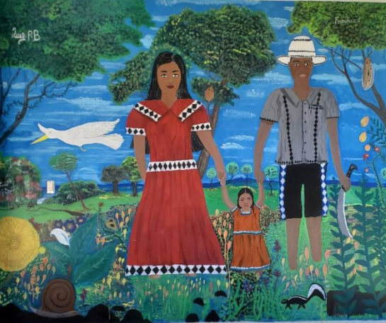 A wall mural of a man and woman in traditional Costa Rican indigenous dress holding the hands of a child.