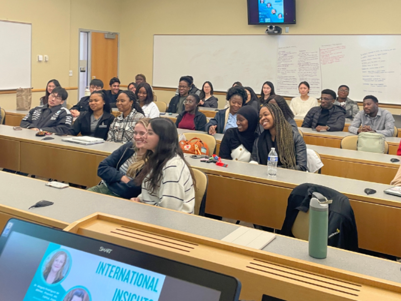 A pharmacy class listens to a speaker