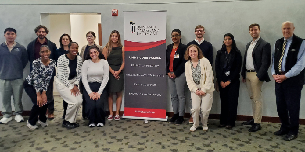 The 2024 Provost's Global Scholars pose for a group photo with Dr. Bruce Jarrell