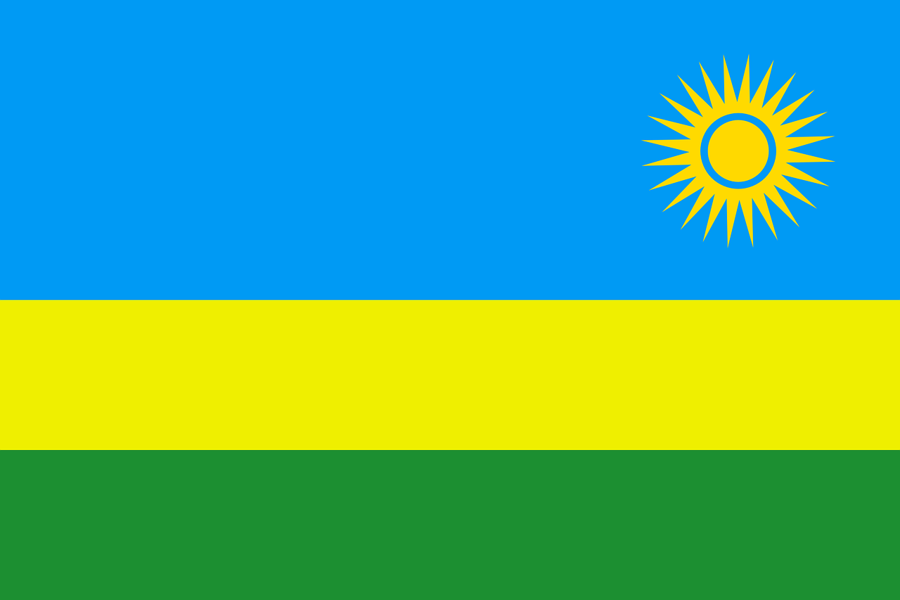Flag of Rwanda with horizontal stripes of bright blue, yellow and green and a sun in the upper right corner