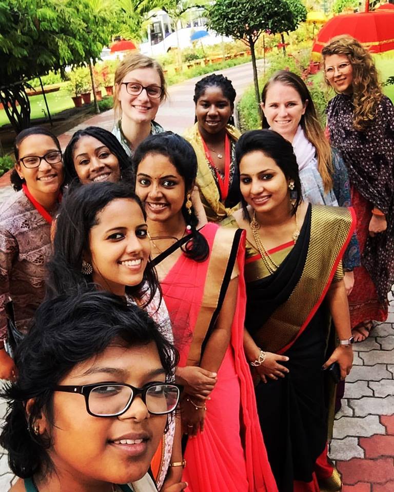 Students pose for a group selfie in India