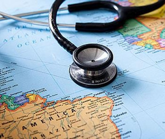 A stethoscope lies on a map