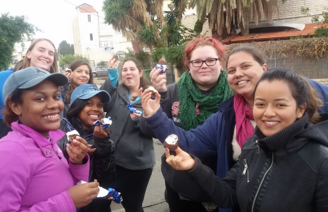 Group of female students share ice-cream in Israel
